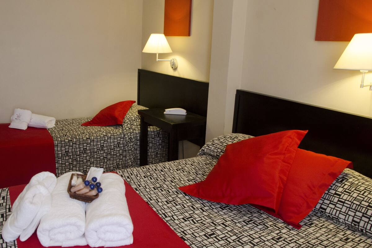 Deluxe Triple Room | Minibar, in-room safe, WiFi (free), bed sheets