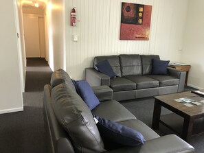 Family Apartment, 3 Bedrooms, Balcony | Living area | 32-inch flat-screen TV with digital channels, TV - Coffs Shearwater Motel (Coffs Harbour)