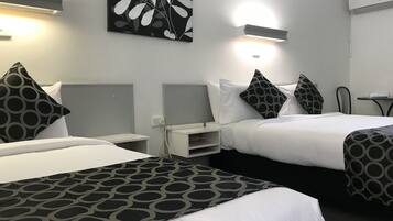 Executive driepersoonskamer | Een strijkplank/strijkijzer, gratis wifi, beddengoed