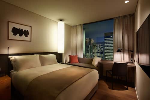 Premium bedding, down duvets, in-room safe, desk