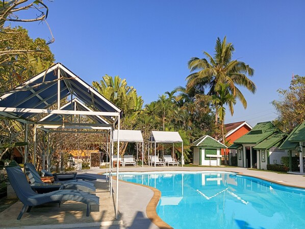 Outdoor pool, pool umbrellas, pool loungers