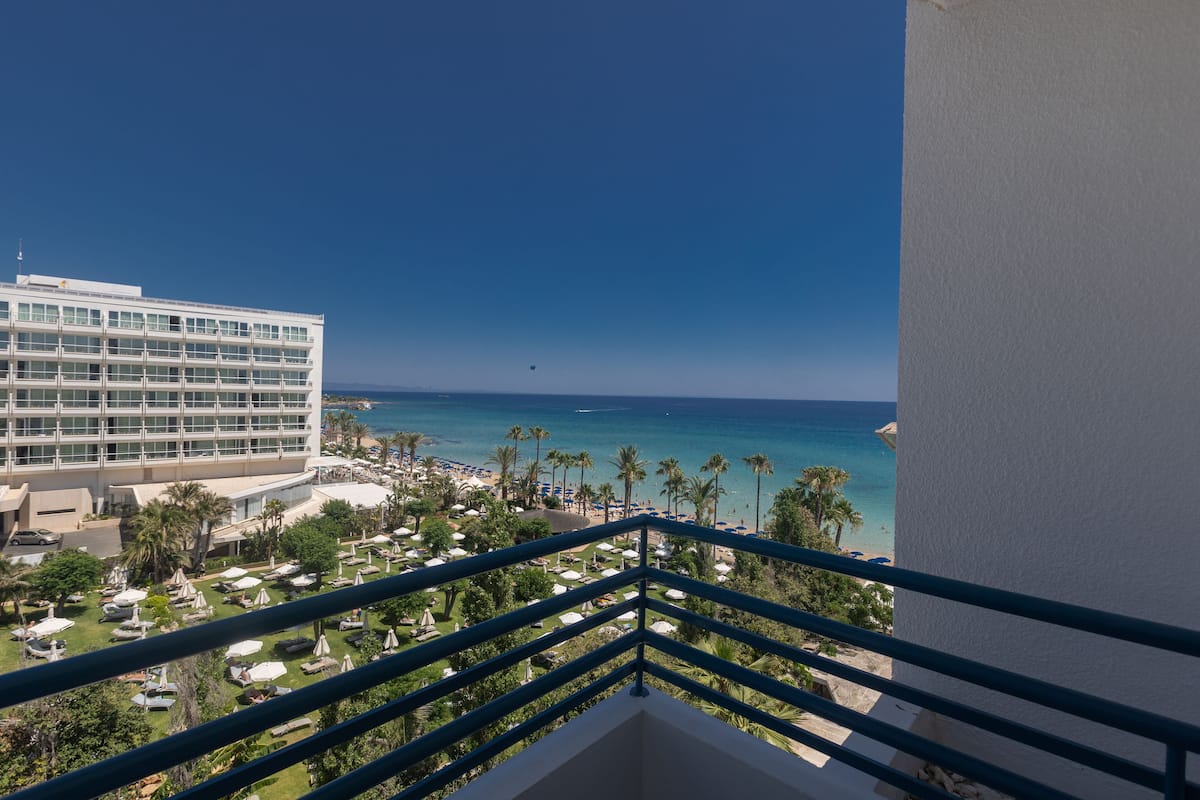 Double or Twin Room, Partial Sea View | Minibar, iron/ironing board, free cribs/infant beds, free WiFi