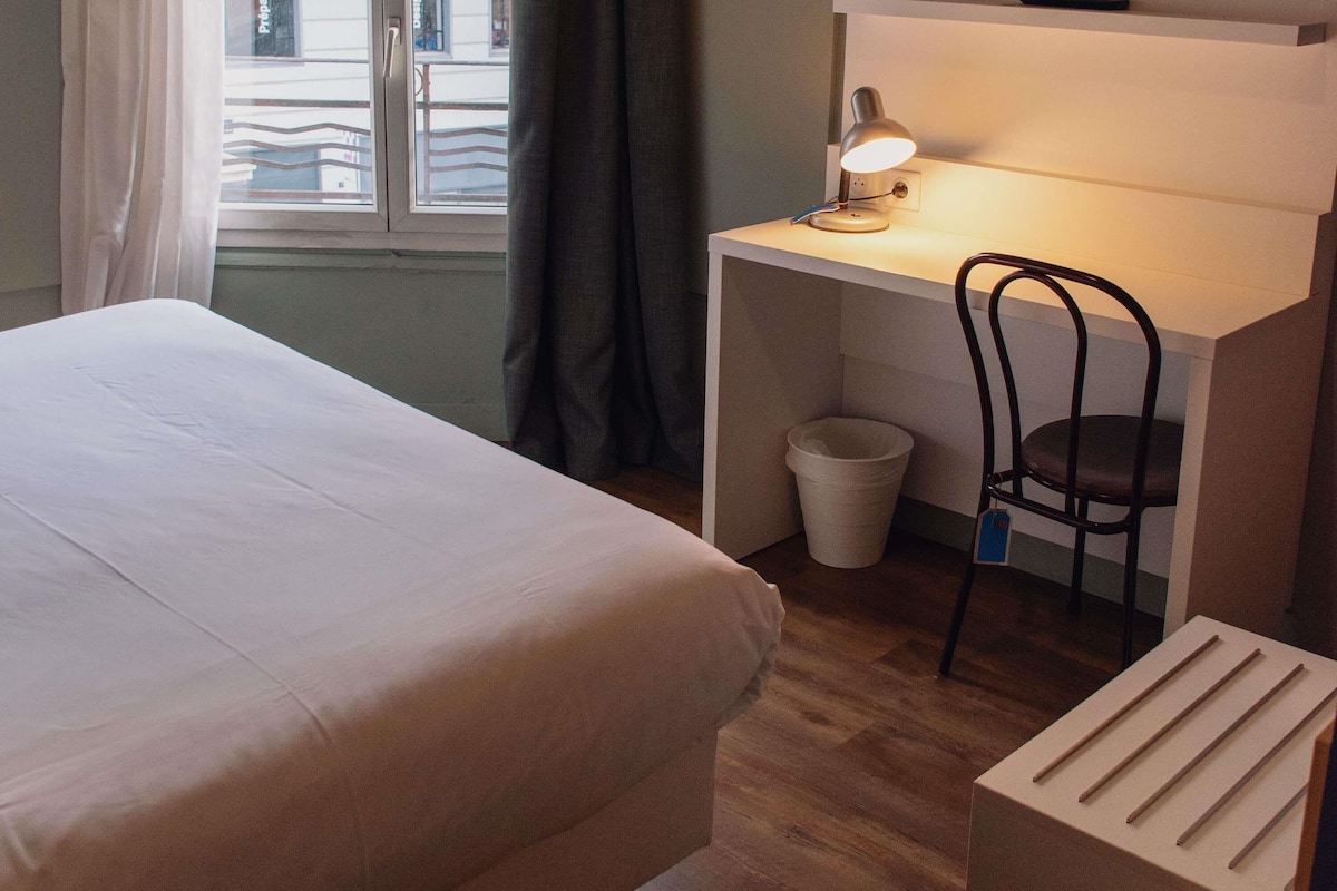 Premium bedding, blackout curtains, iron/ironing board, free WiFi