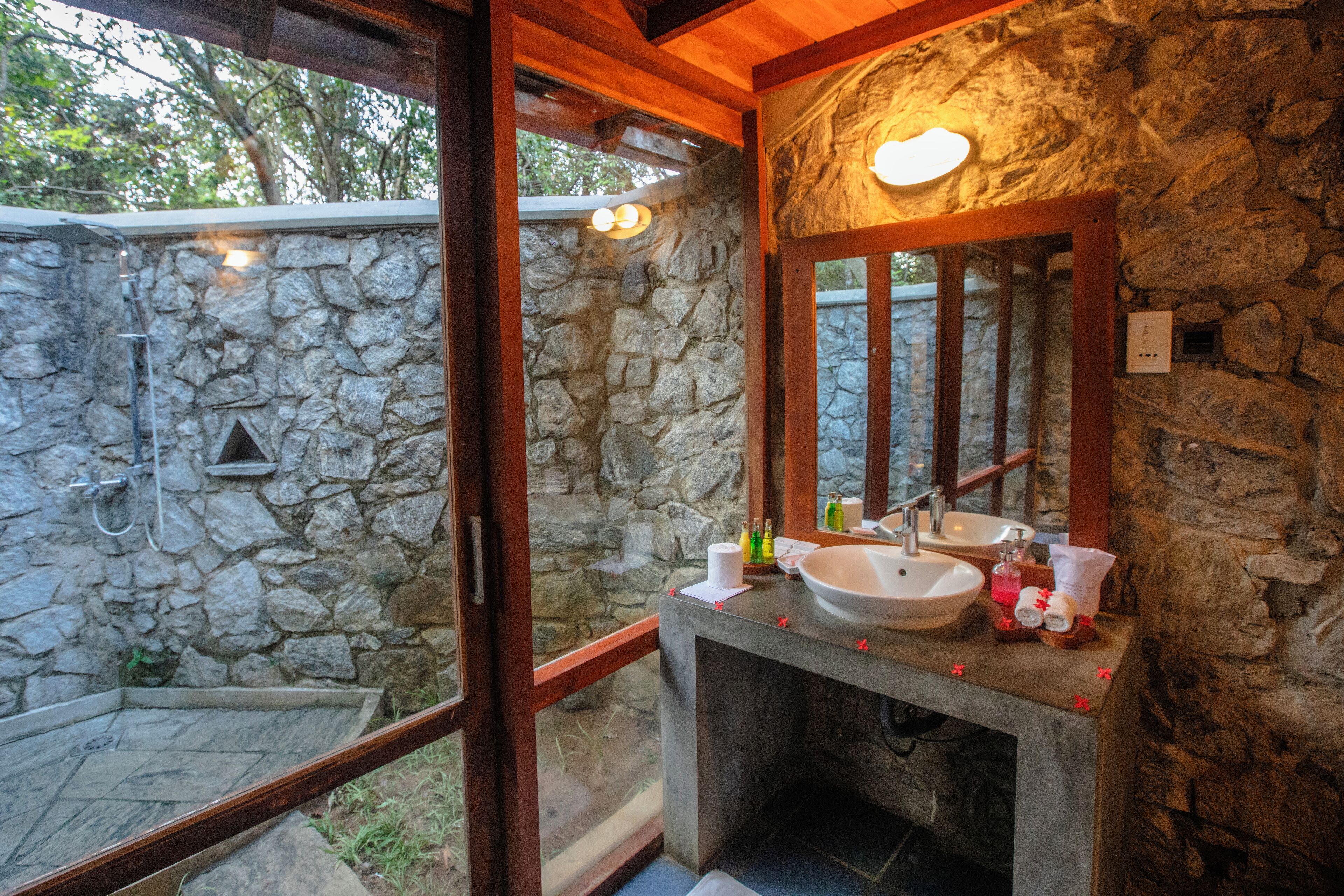 deluxe villa, 1 king bed, patio, garden area | bathroom | shower, rainfall showerhead, free toiletries, hair dryer