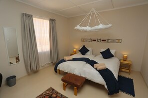 2 habitaciones, tabla de planchar con plancha y ropa de cama