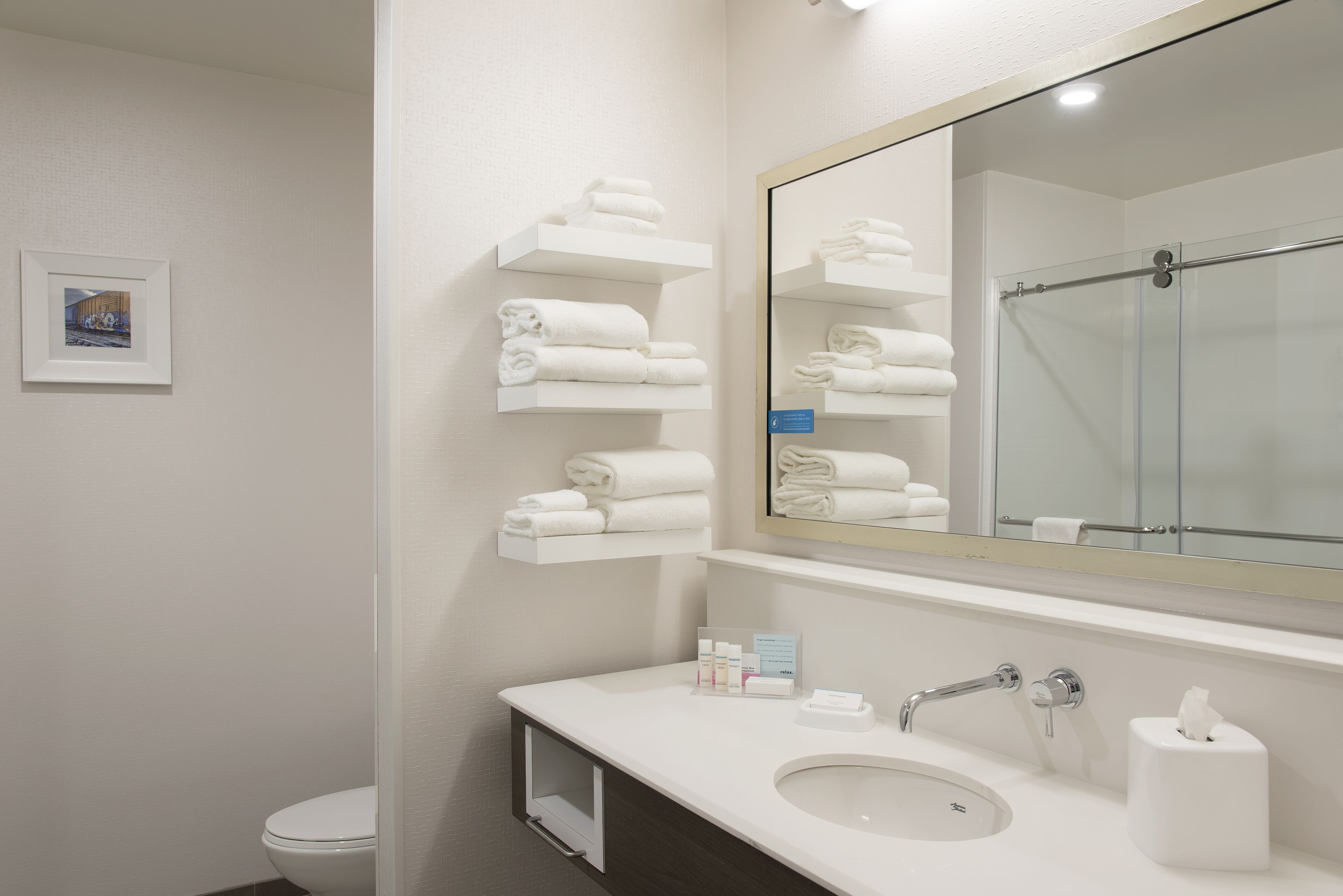 shower, hair dryer, bathrobes, towels