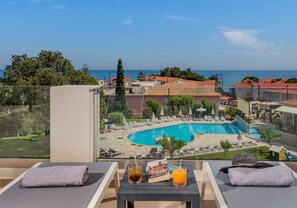 Habitación superior | Ropa de cama de alta calidad y colchones con acolchado adicional