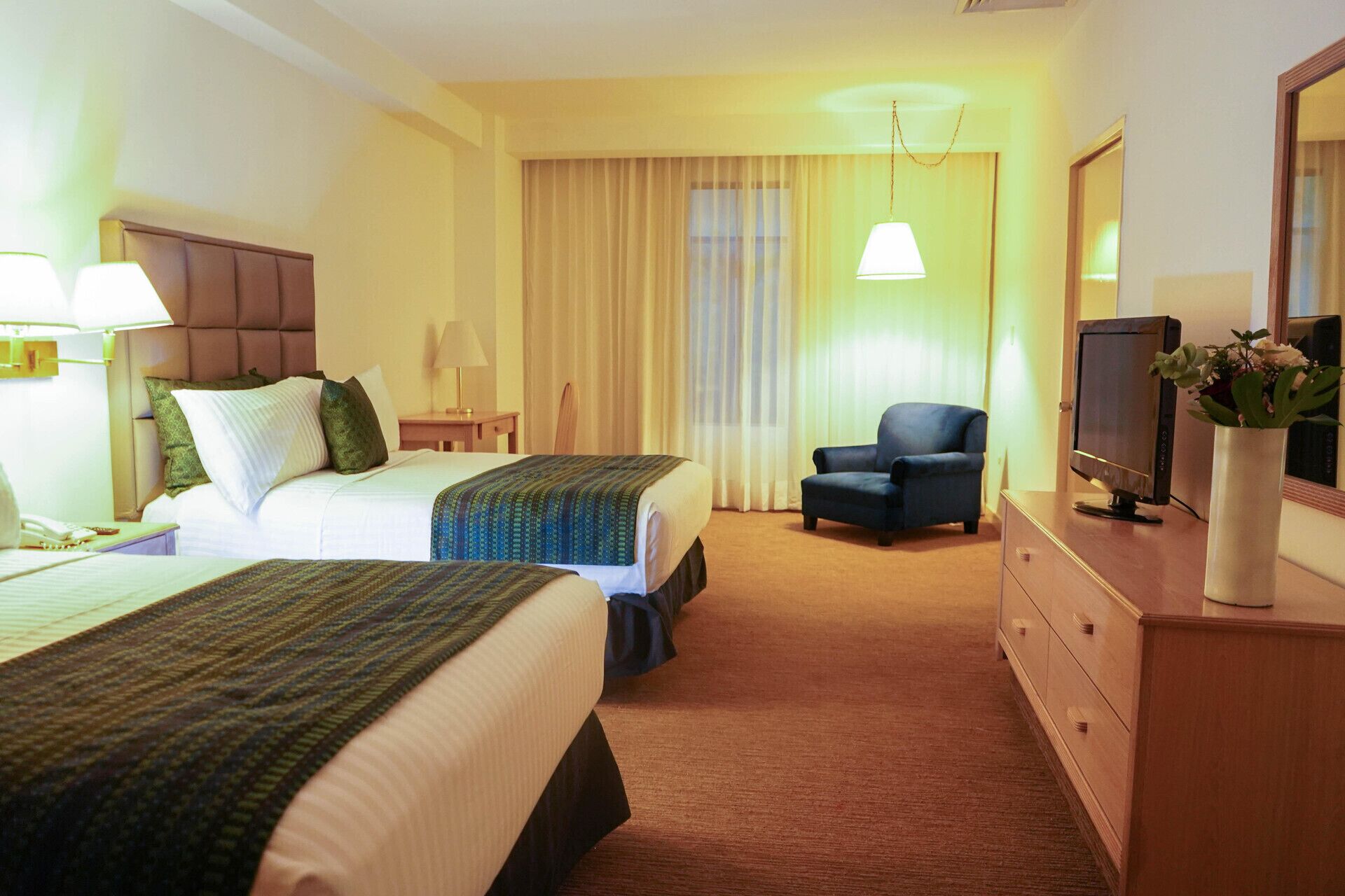 Premium bedding, down duvets, pillow-top beds, in-room safe