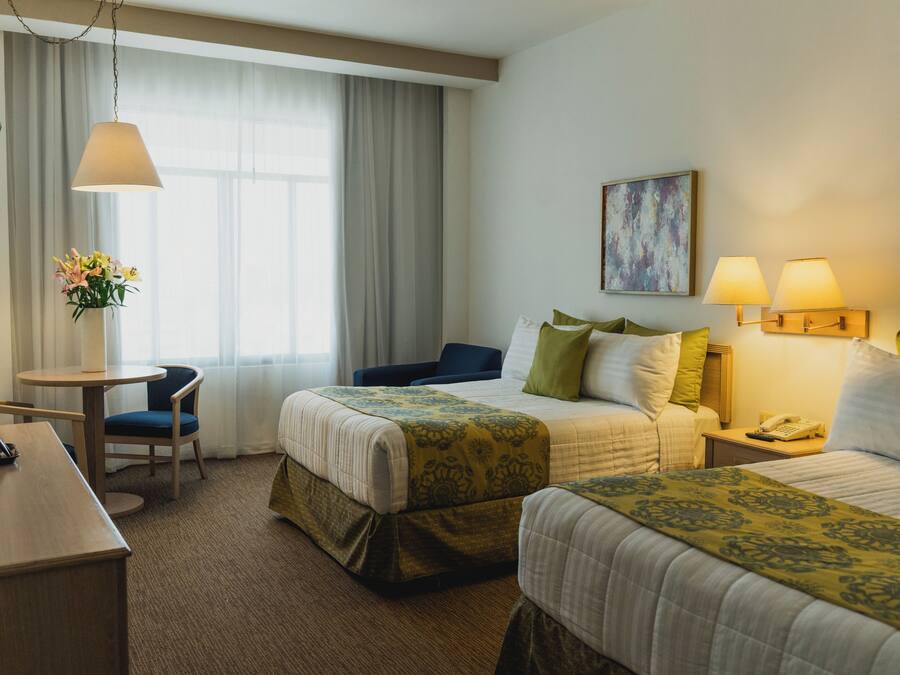 Premium bedding, down duvets, pillow-top beds, in-room safe