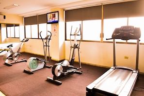 Stay active with our fully equipped gym featuring stationary bikes, an elliptical trainer, and a treadmill.