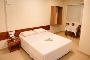 Minibar, desk, laptop workspace, blackout curtains