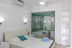 Romantic Studio, 1 Queen Bed, Jetted Tub (1) | Bathroom | Shower, hair dryer, bathrobes, towels - Nissi 49 Apartments (Ayia Napa)
