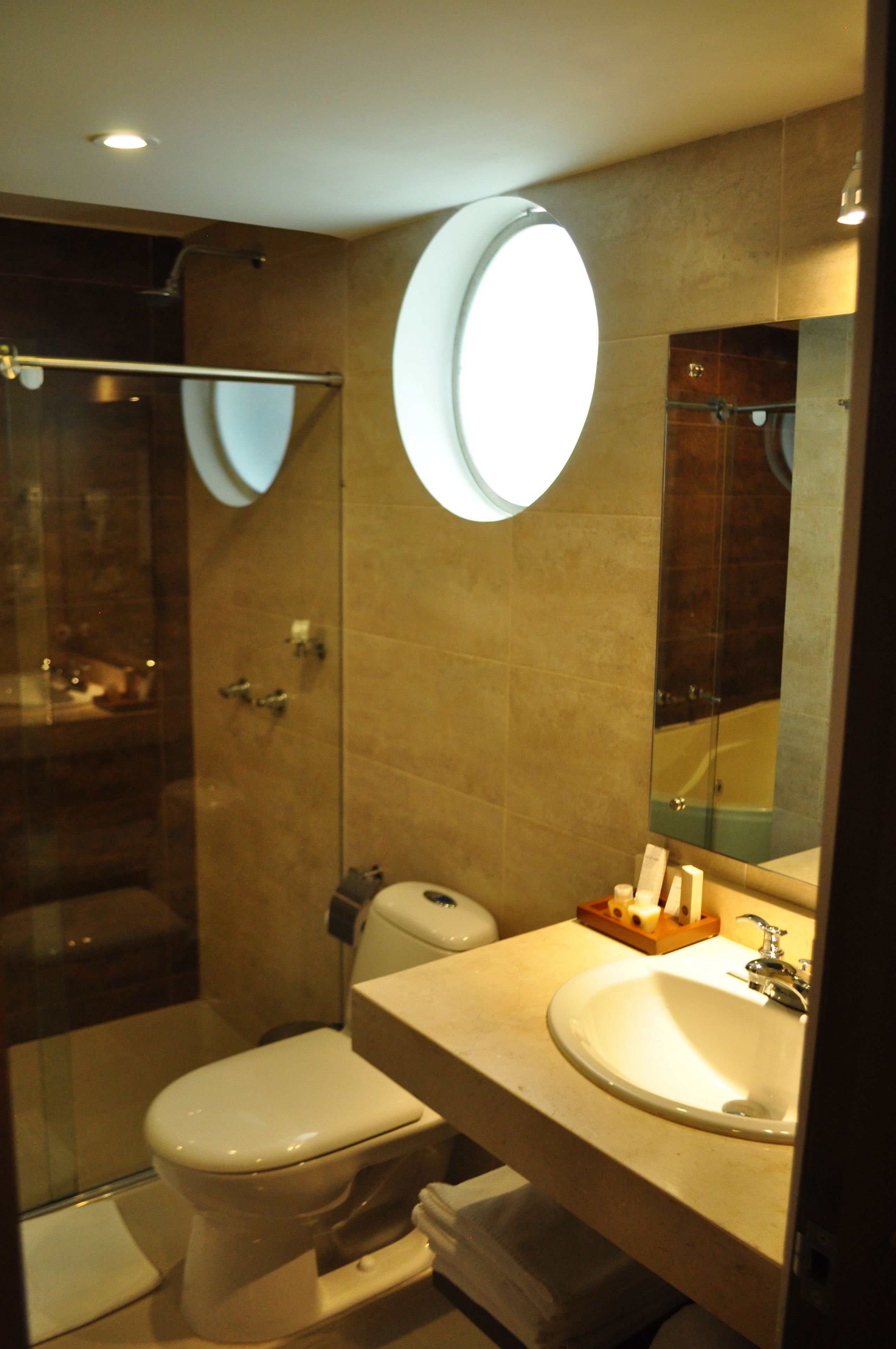 shower, rainfall showerhead, hair dryer, towels