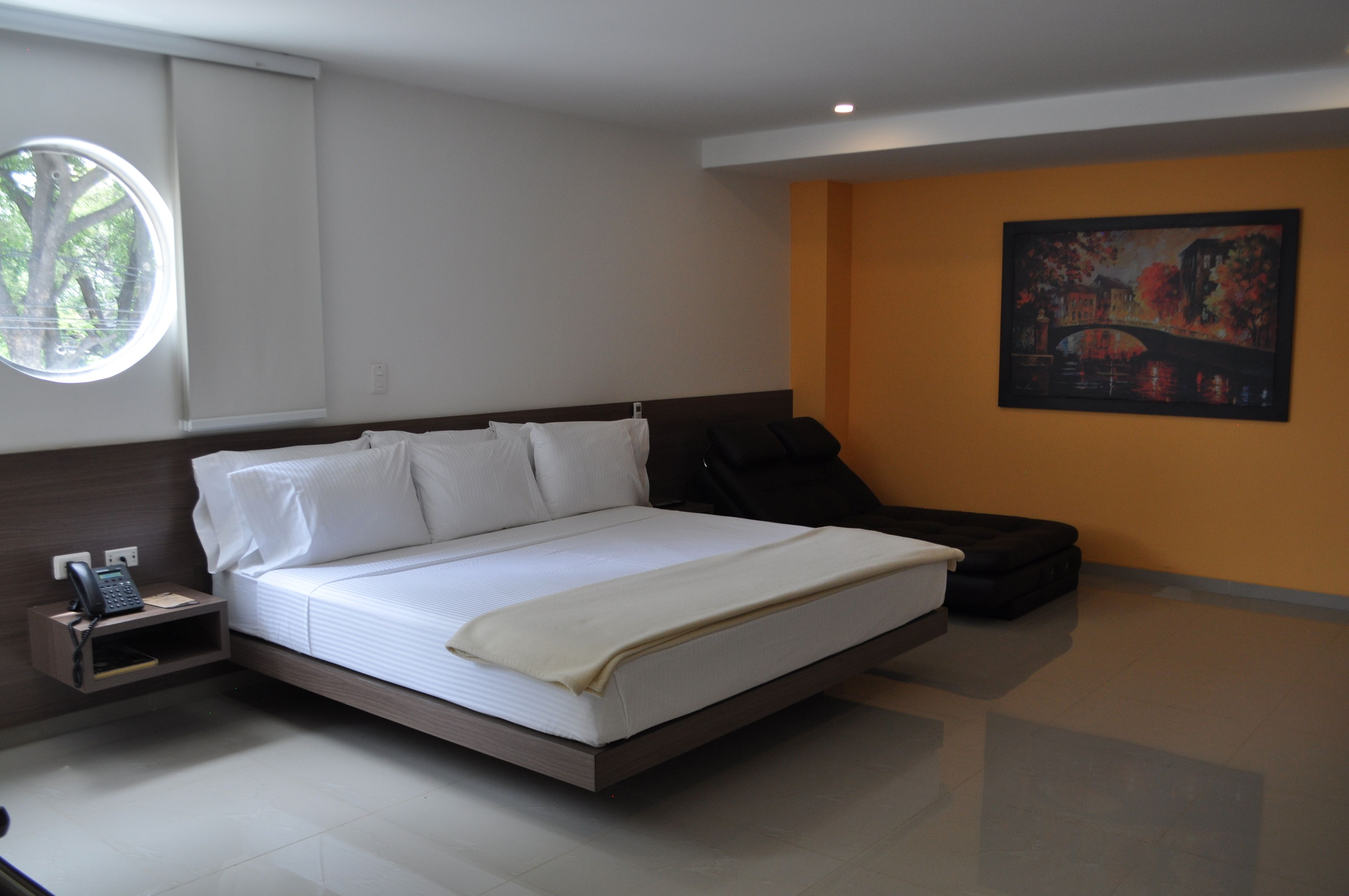 deluxe suite | bathroom | shower, rainfall showerhead, hair dryer, towels