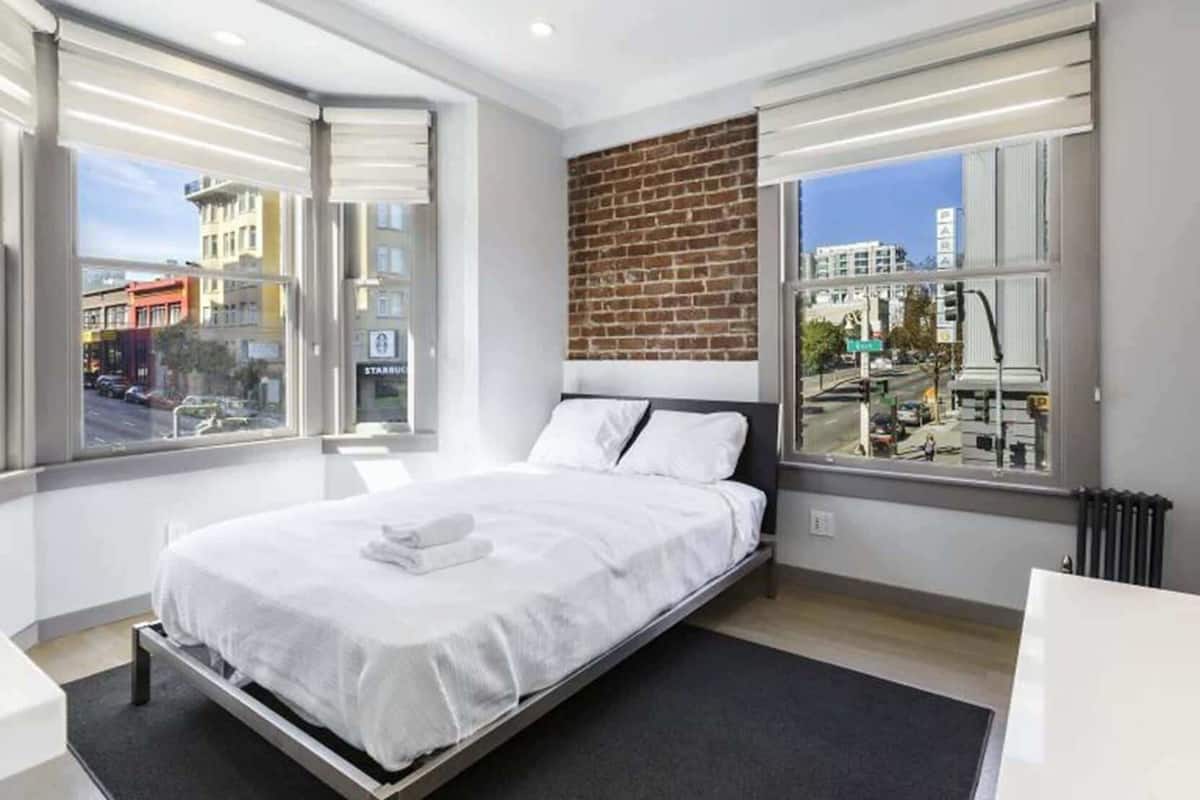 Premium bedding, desk, laptop workspace, free WiFi