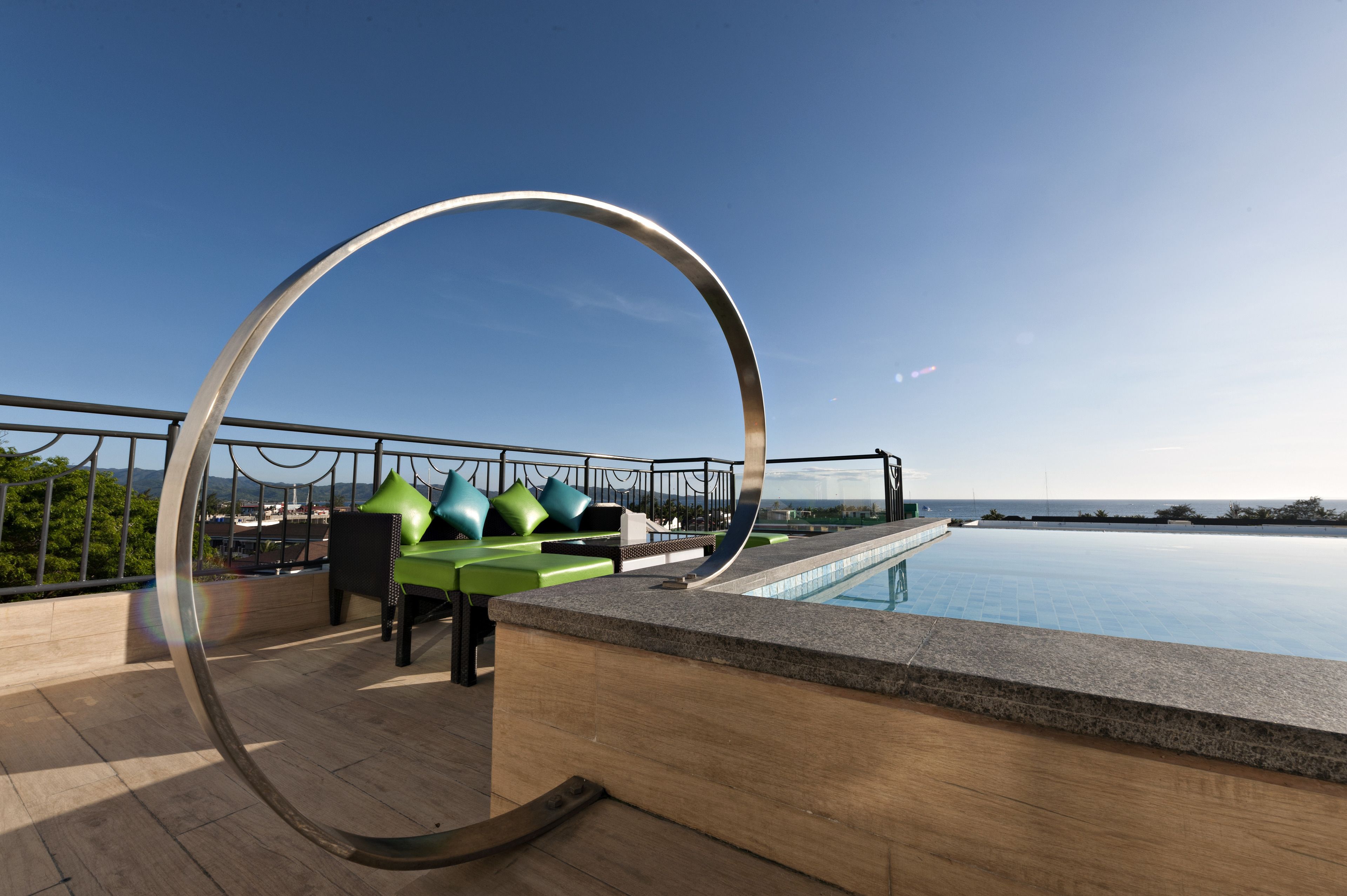 outdoor pool, open 8:00 am to 10:00 pm, pool umbrellas, pool loungers