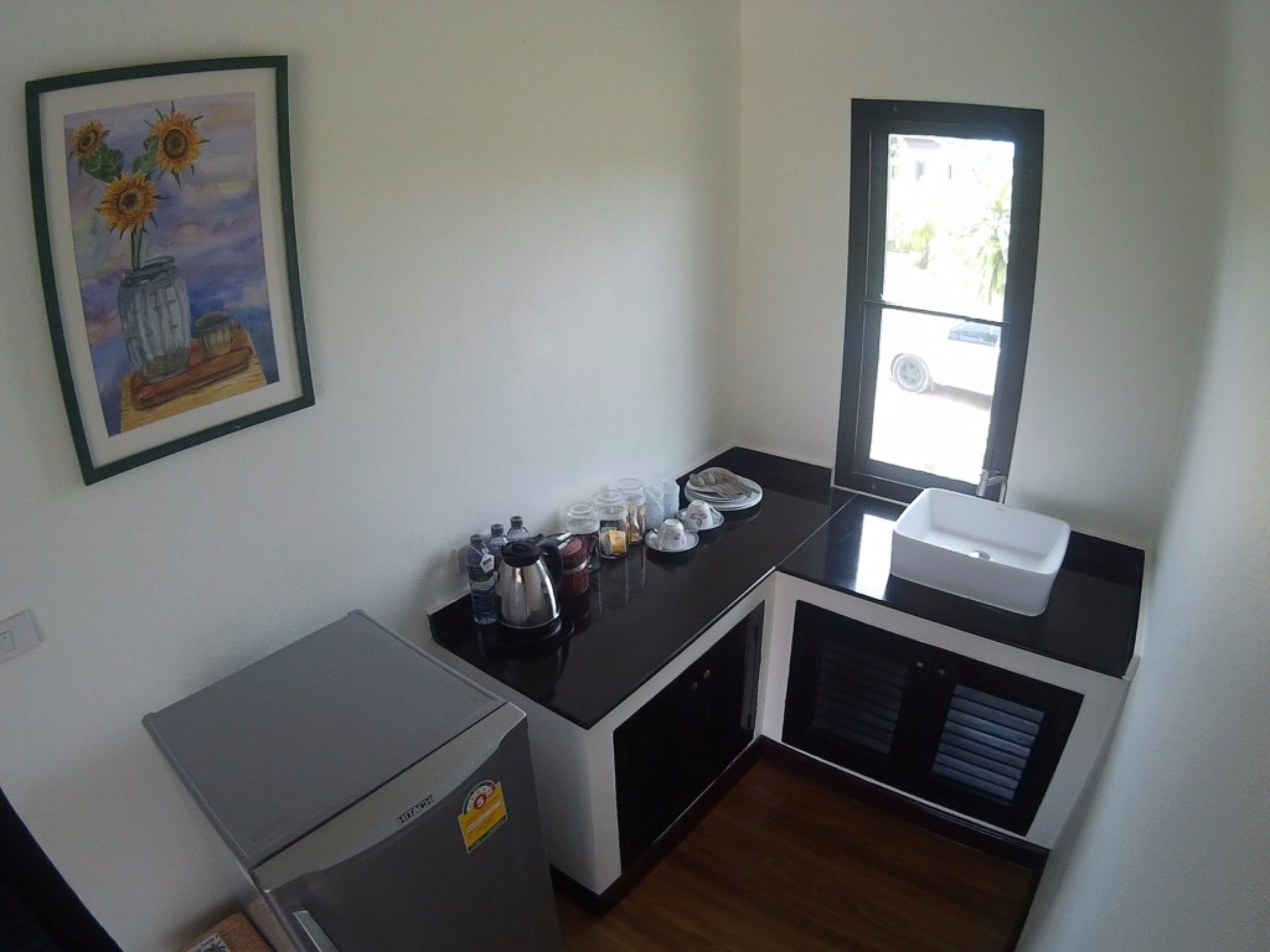 sunset villa | private kitchenette | fridge, microwave, electric kettle, cookware/dishes/utensils