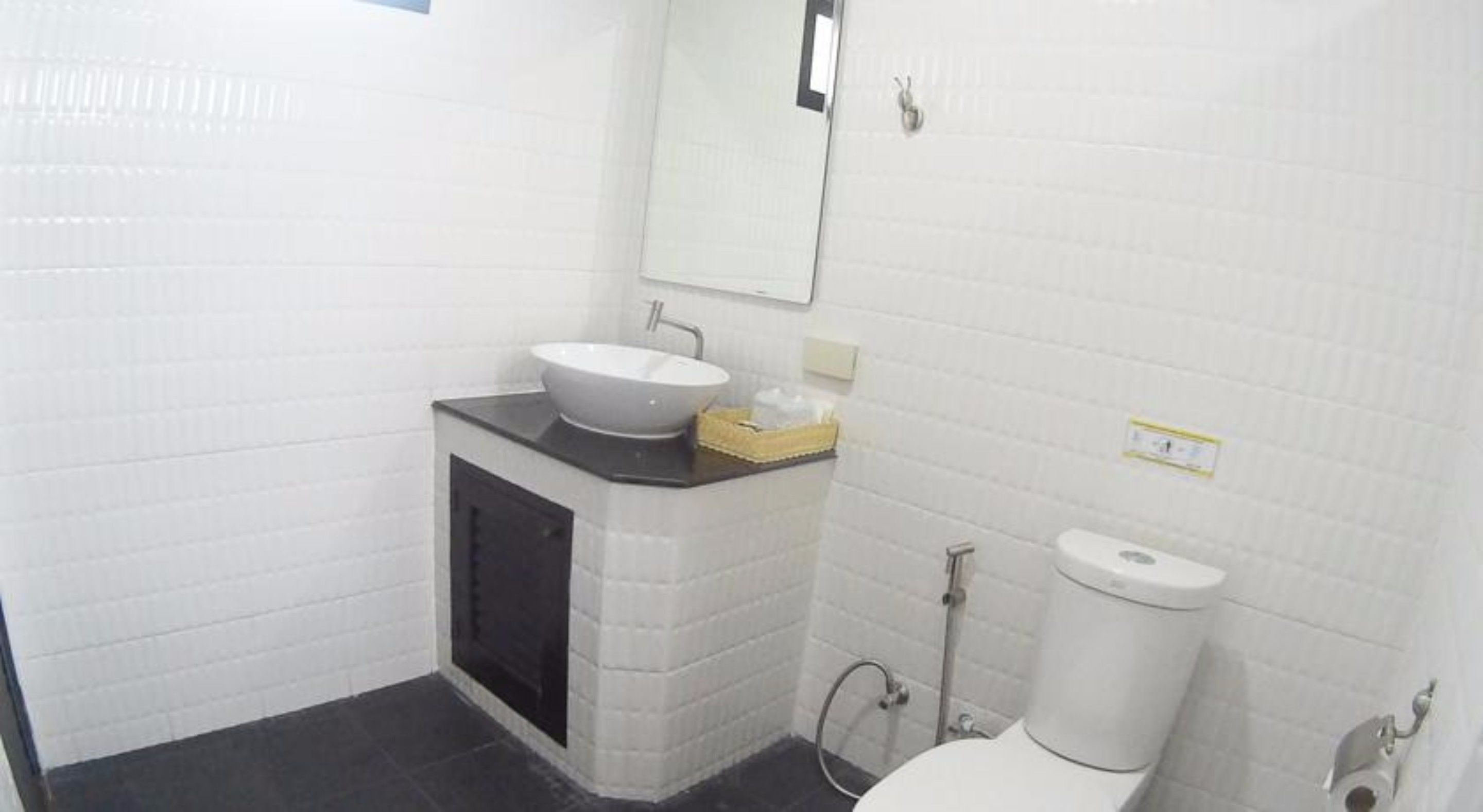 pool villa with partial sea view | bathroom sink