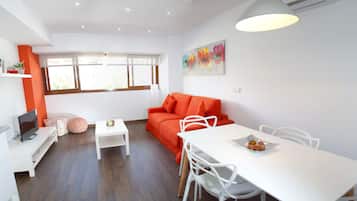 City Studio Suite, 1 Queen Bed with Sofa bed | Living area | LED TV