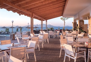 Breakfast, lunch, dinner served; international cuisine, pool views