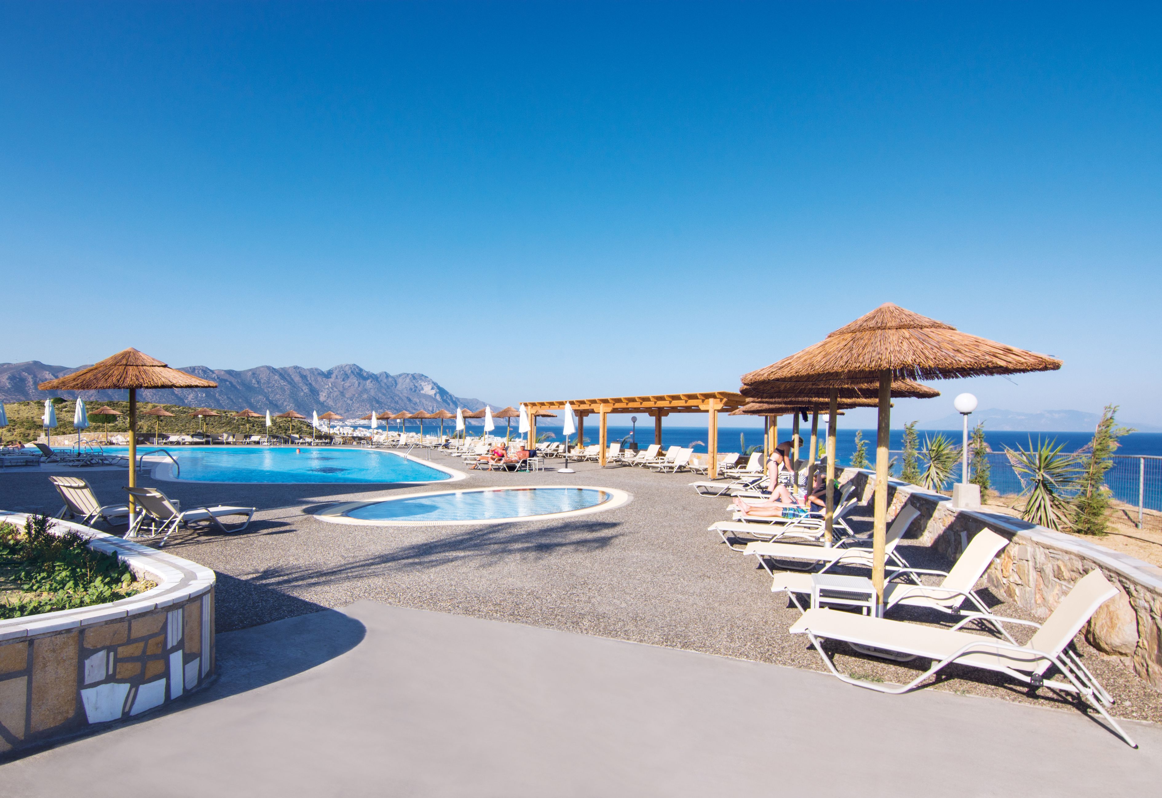 5 outdoor pools, pool umbrellas, pool loungers
