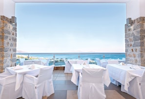 Breakfast, lunch, dinner served; international cuisine, pool views