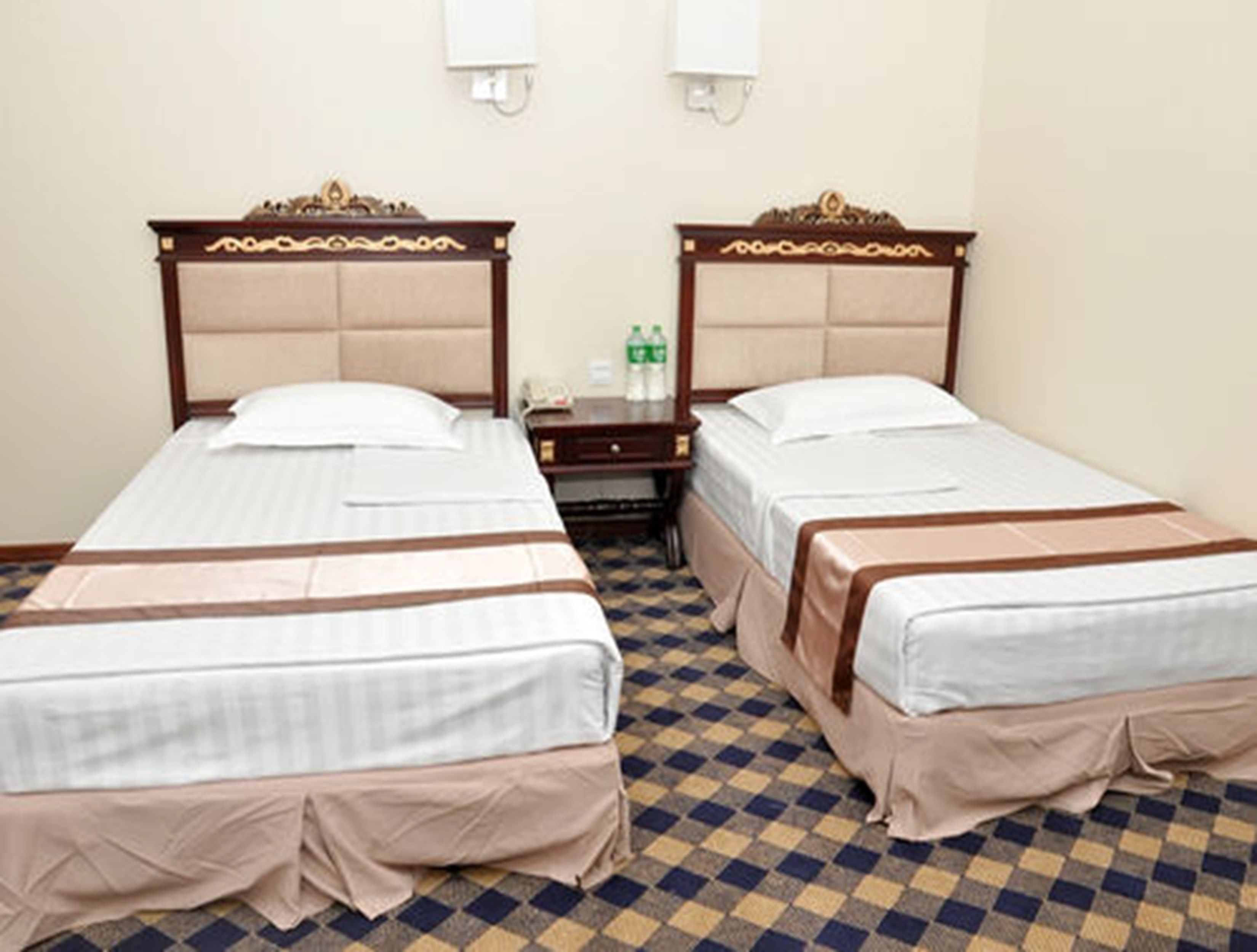 deluxe room | minibar, in-room safe, desk, blackout curtains