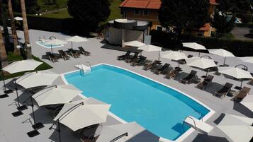 Seasonal outdoor pool, pool umbrellas, sun loungers