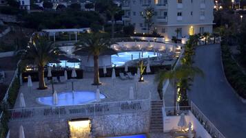 2 outdoor pools, pool umbrellas, sun loungers