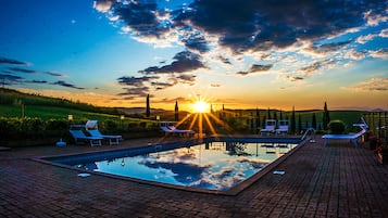 Outdoor pool, pool umbrellas, pool loungers