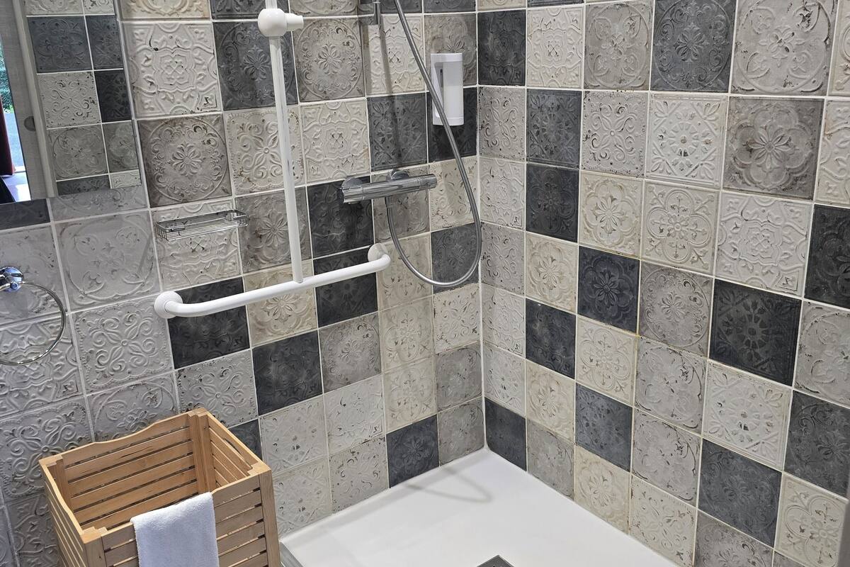 deluxe double room, 1 king bed | bathroom | free toiletries, hair dryer, bathrobes, slippers