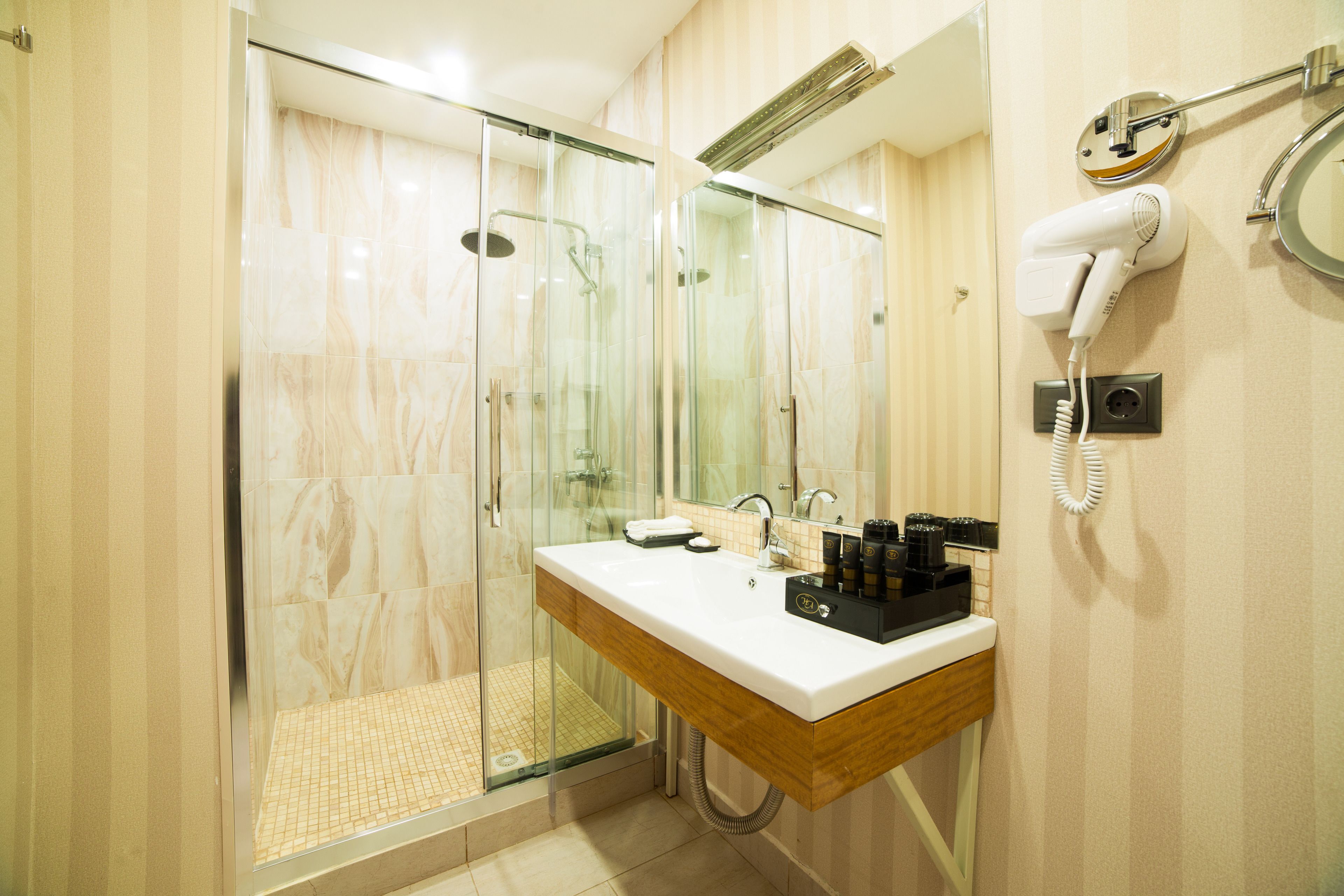 shower, free toiletries, hair dryer, bathrobes