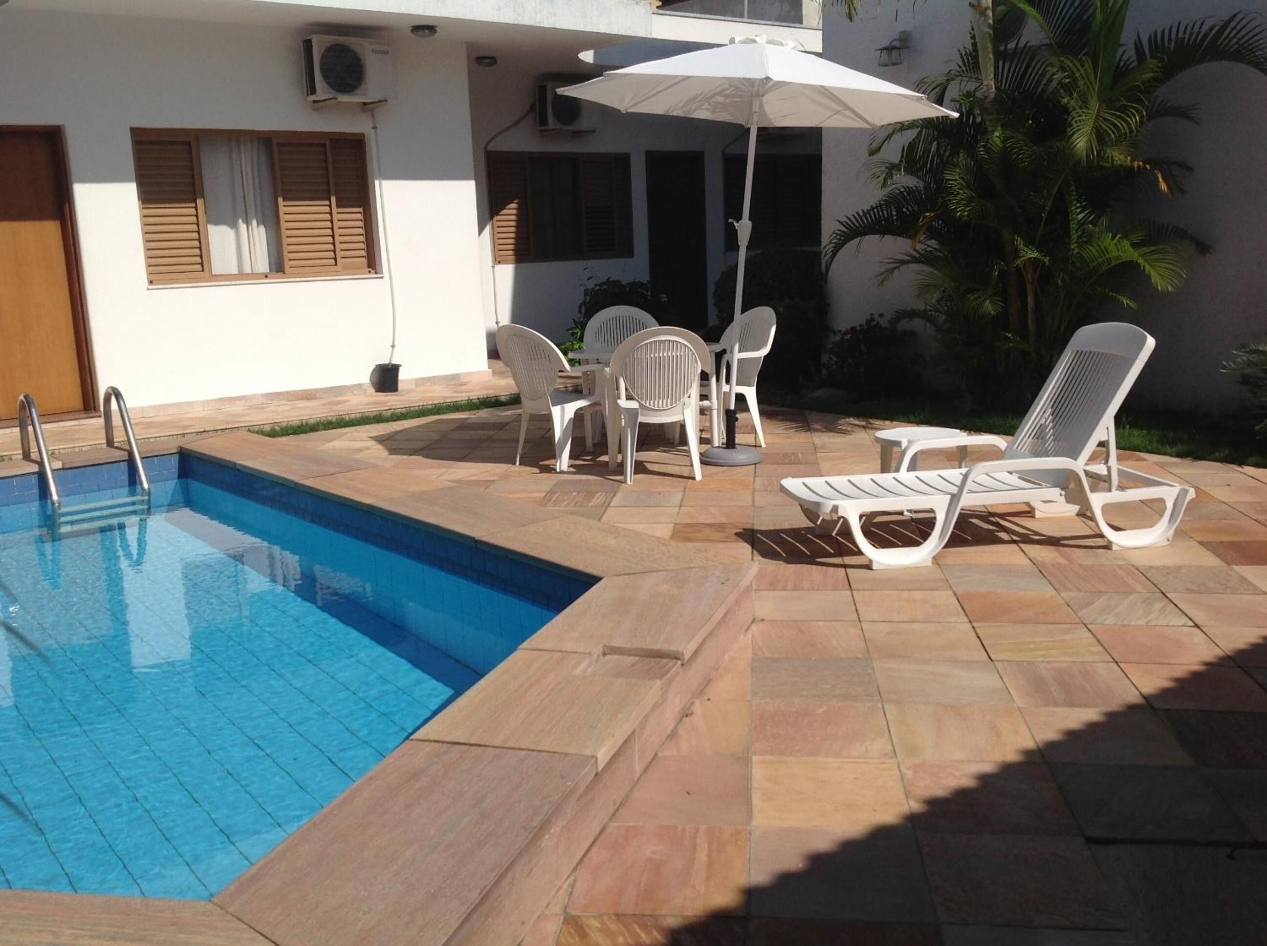 outdoor pool, pool loungers