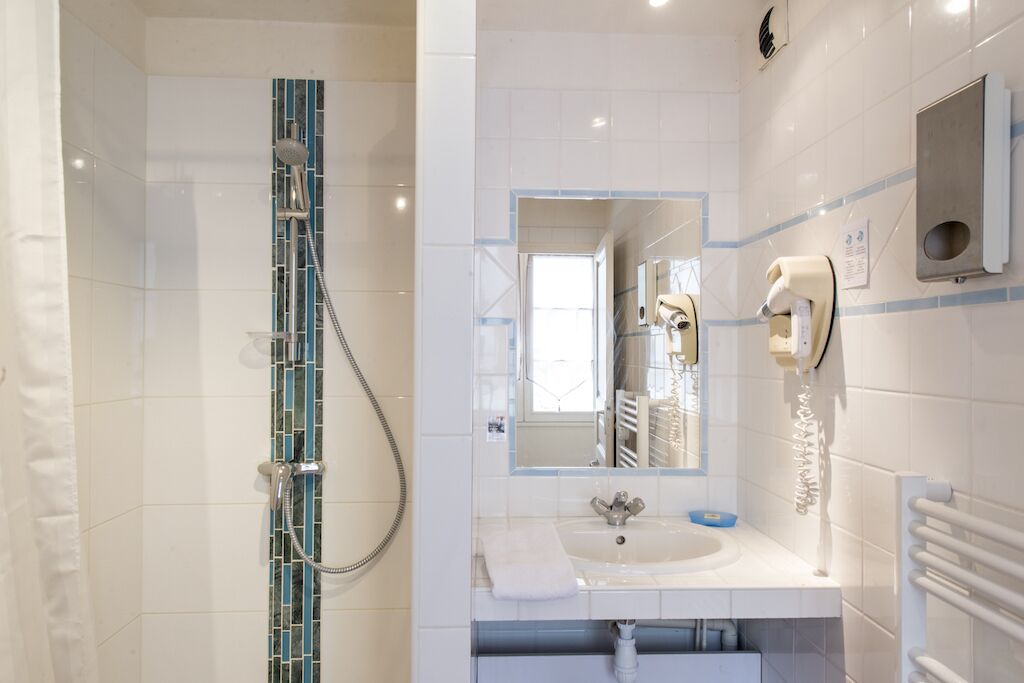 comfort room king bed | bathroom | free toiletries, hair dryer, towels