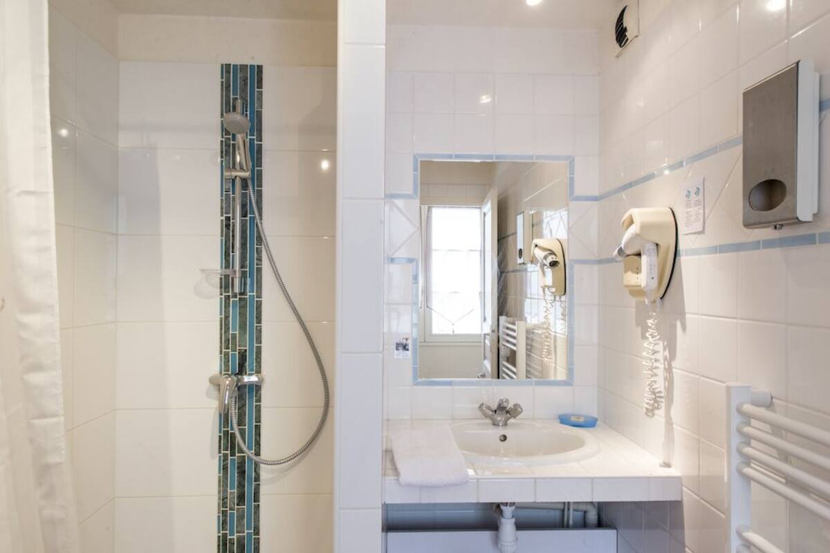 comfort room king bed | bathroom | free toiletries, hair dryer, towels