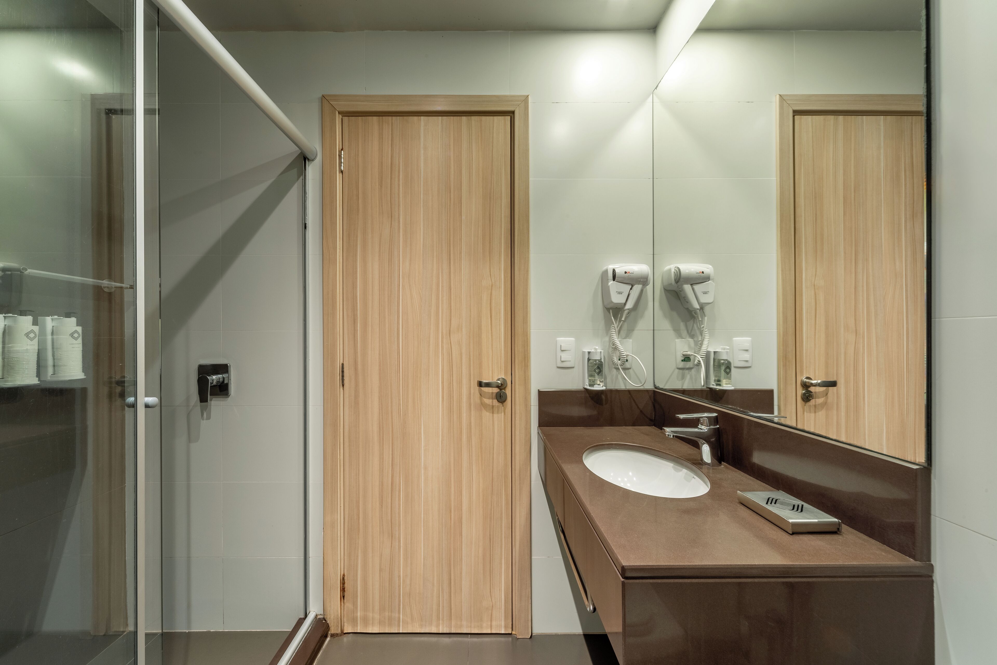 deluxe triple room | bathroom | shower, free toiletries, hair dryer, towels