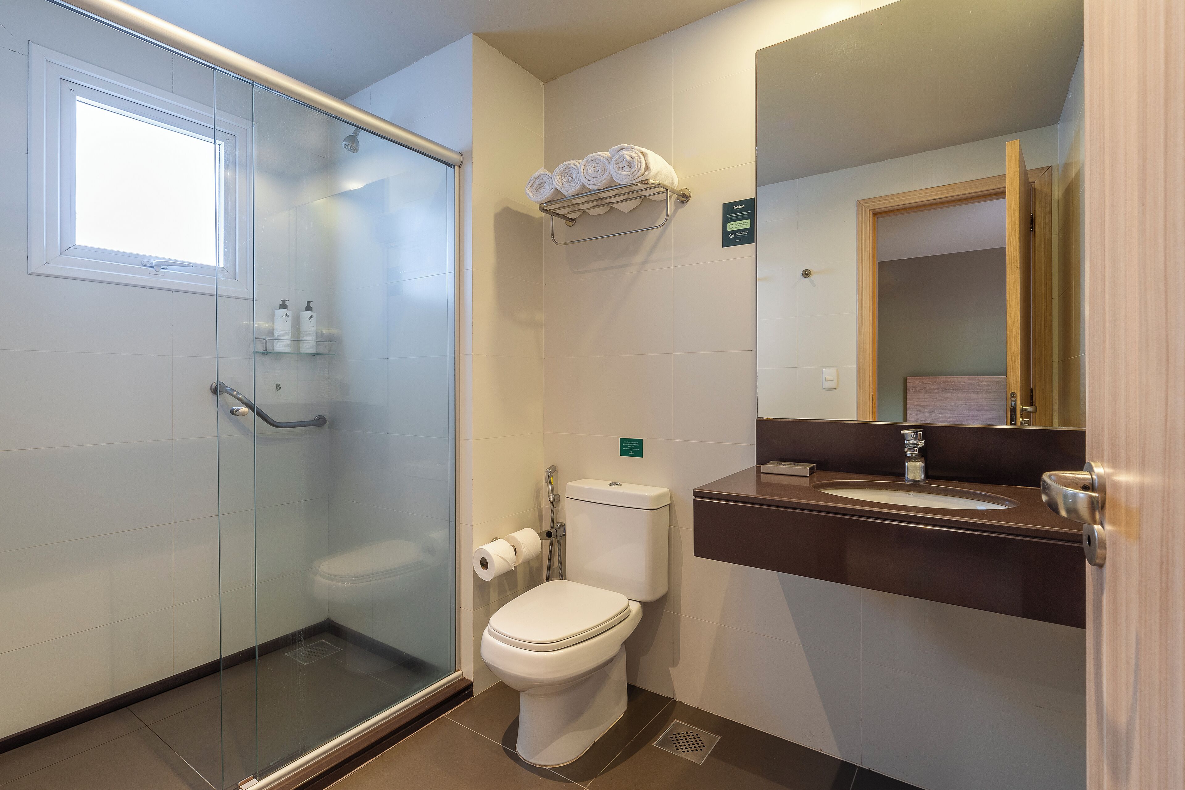 deluxe quadruple room | bathroom | shower, free toiletries, hair dryer, towels