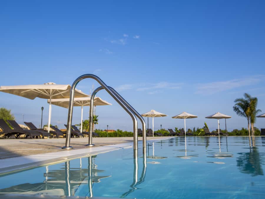 Outdoor pool, open 8:00 AM to 7:00 PM, pool umbrellas, sun loungers