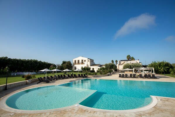 Outdoor pool, open 8:00 AM to 7:00 PM, pool umbrellas, sun loungers