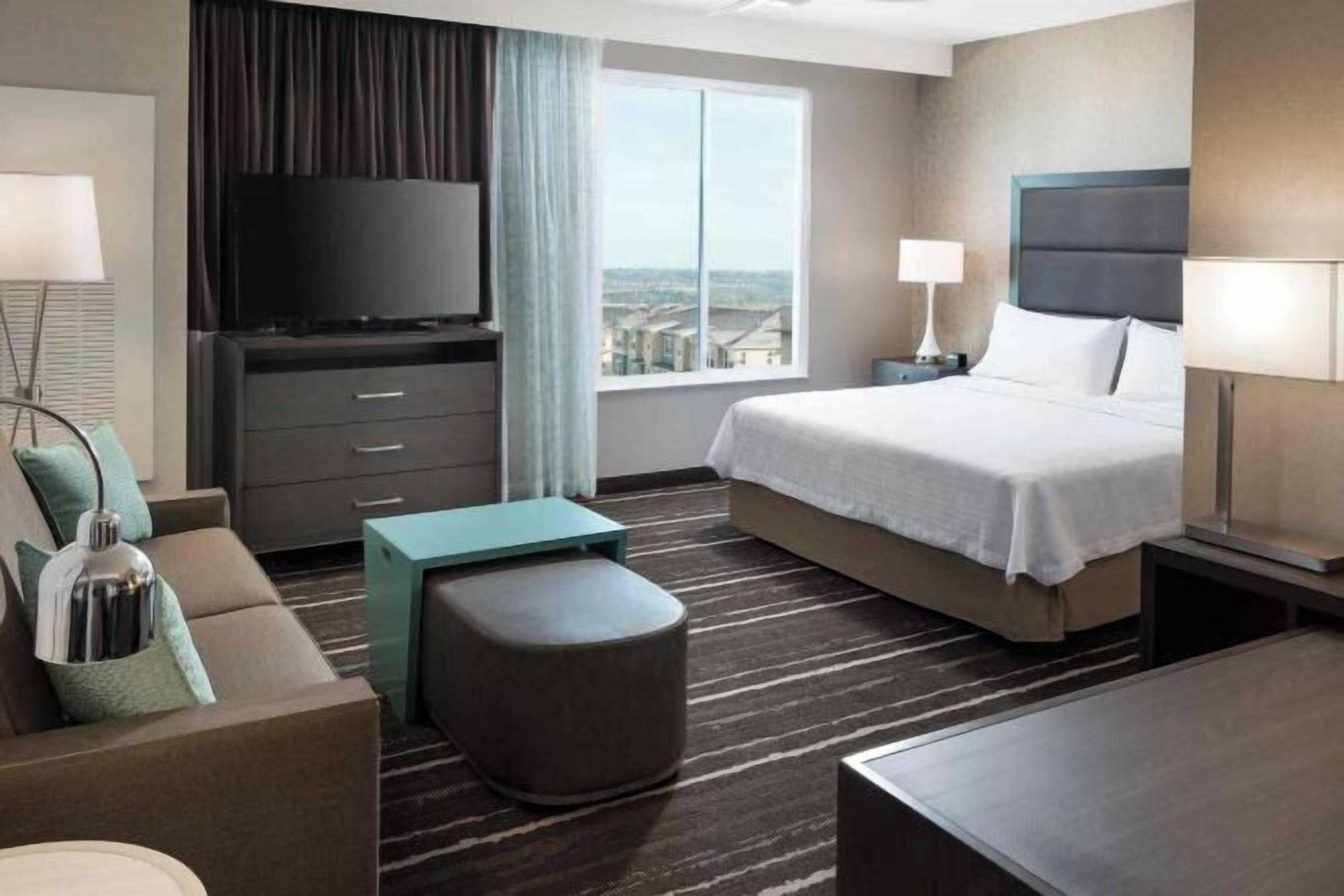 Desk, laptop workspace, blackout drapes, iron/ironing board