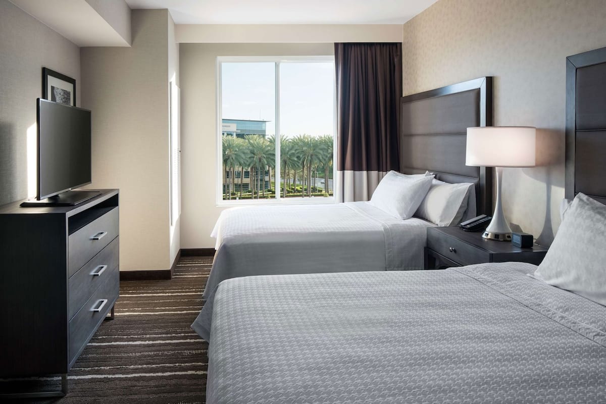 Desk, laptop workspace, blackout curtains, iron/ironing board