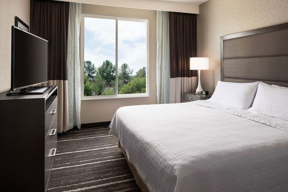 Desk, laptop workspace, blackout curtains, iron/ironing board