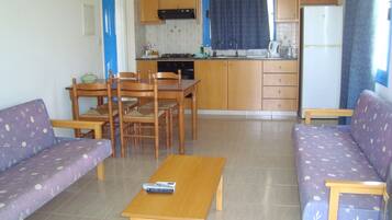 Apartment, Balcony, Sea View | Living area | Flat-screen TV, ping pong