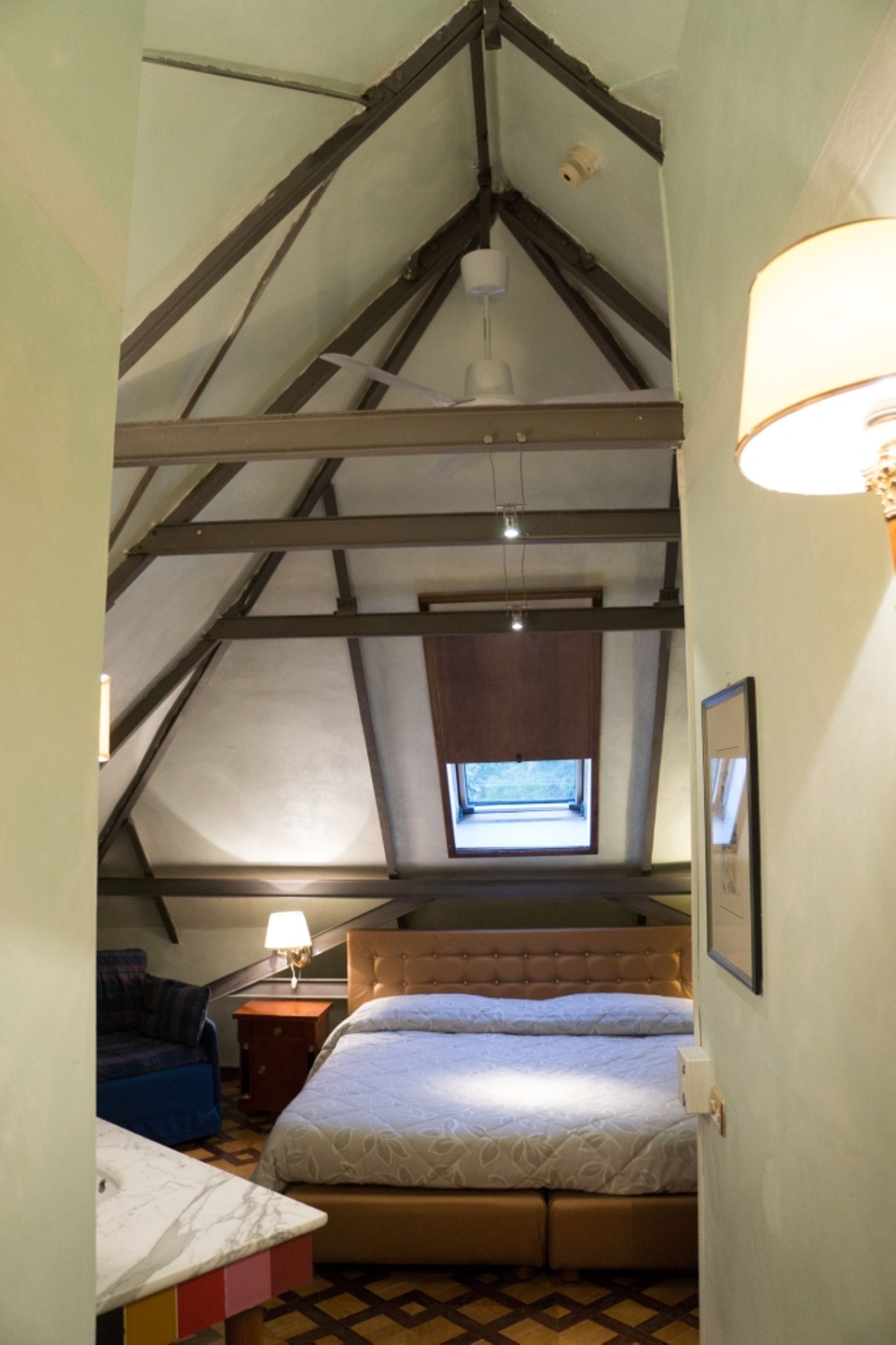 economy triple room | minibar, in-room safe, cots/infant beds, free wifi