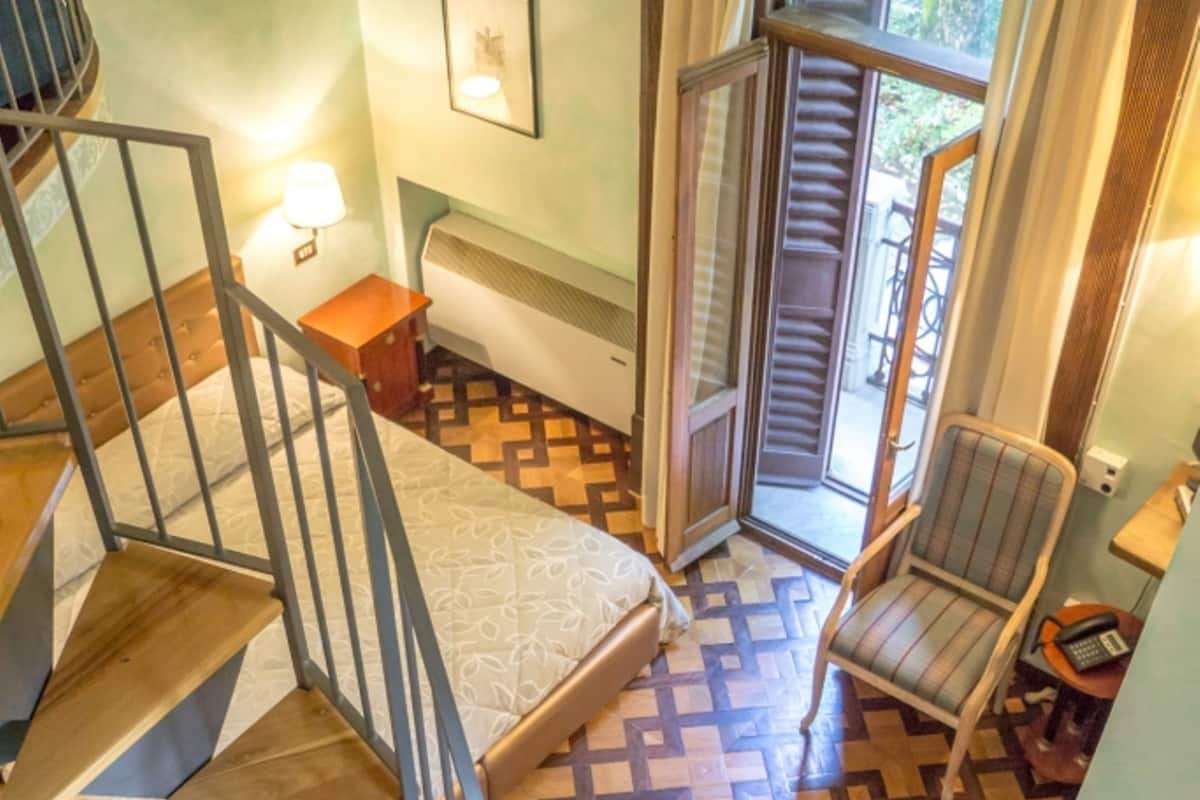 Junior Suite, Fireplace | Staircase