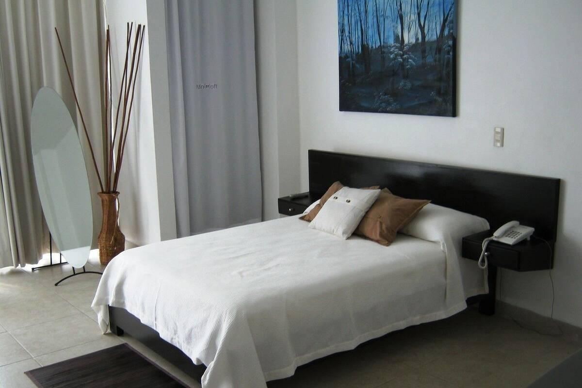 Basic Room | Egyptian cotton sheets, premium bedding, down comforters, in-room safe