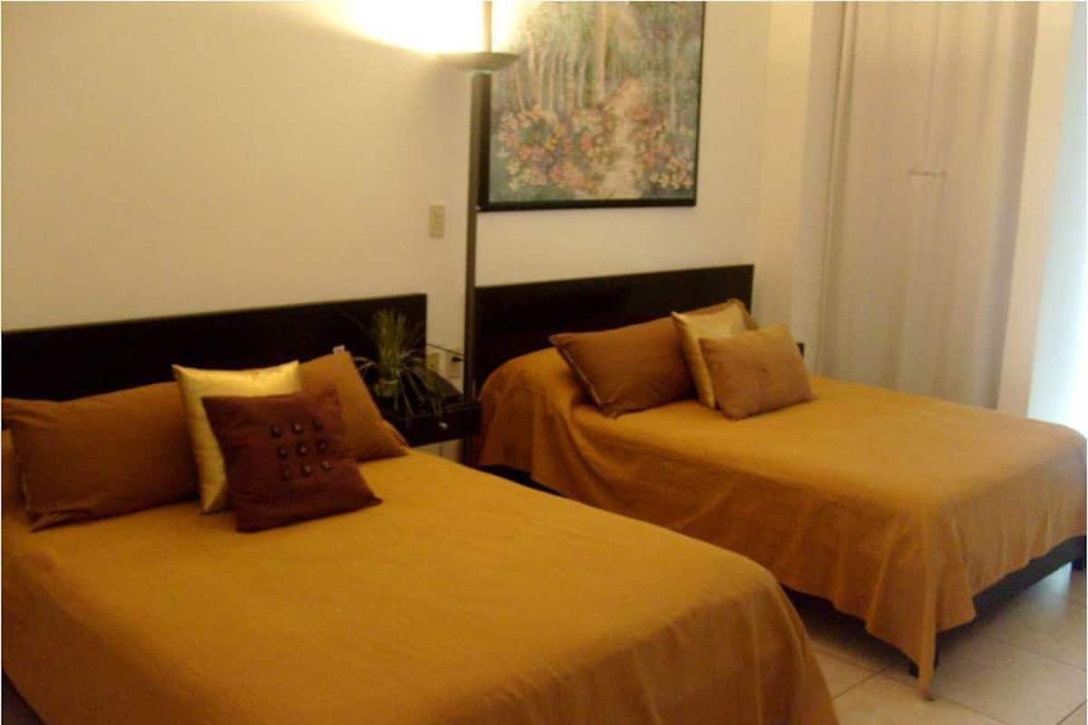 Egyptian cotton sheets, premium bedding, down comforters, in-room safe
