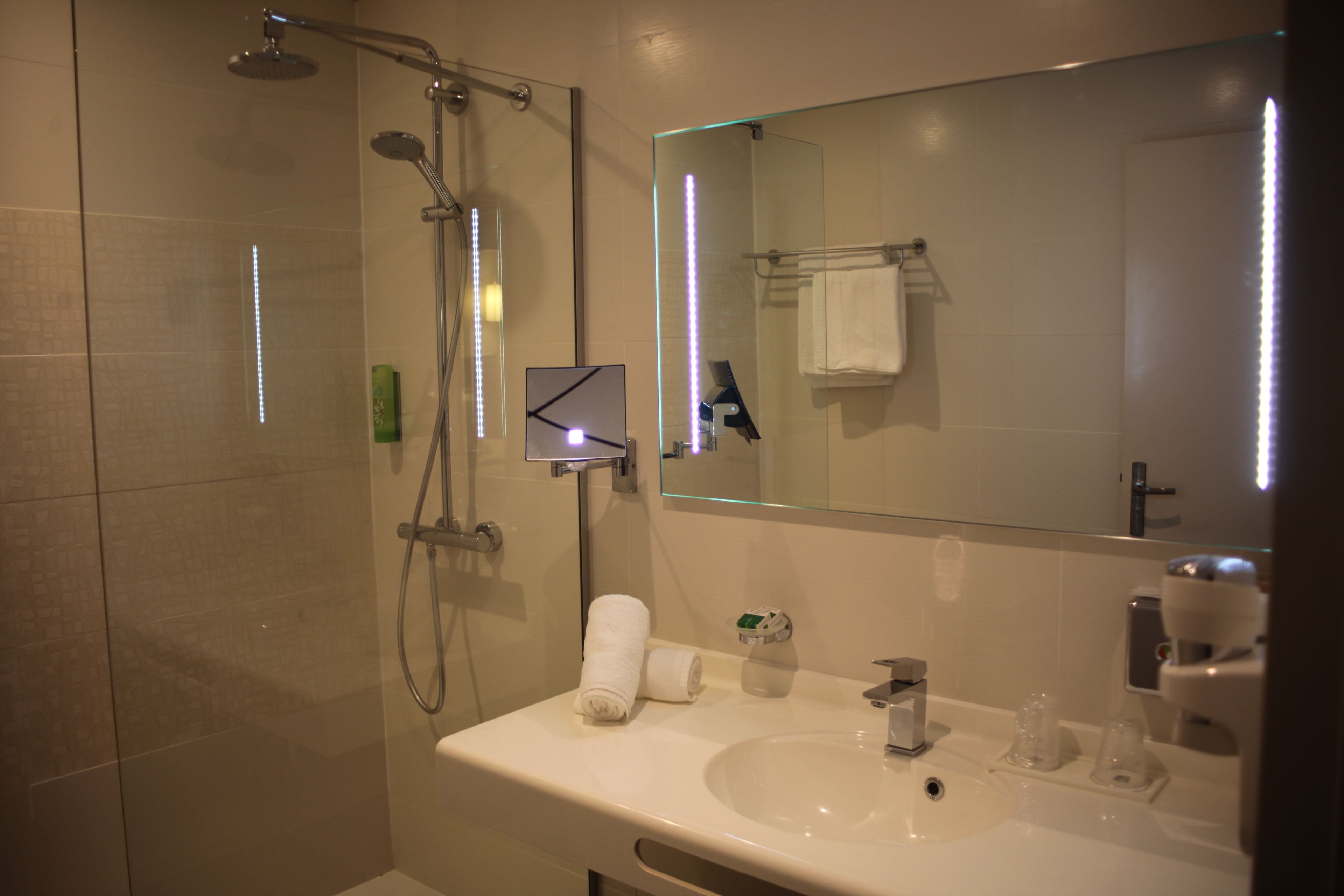 shower, eco-friendly toiletries, towels