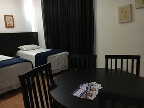 Standard Quadruple Room | Premium bedding, minibar, in-room safe, desk - Brás Palace Hotel (São Paulo)