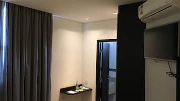 Habitación doble Deluxe | Ropa de cama de alta calidad y minibar